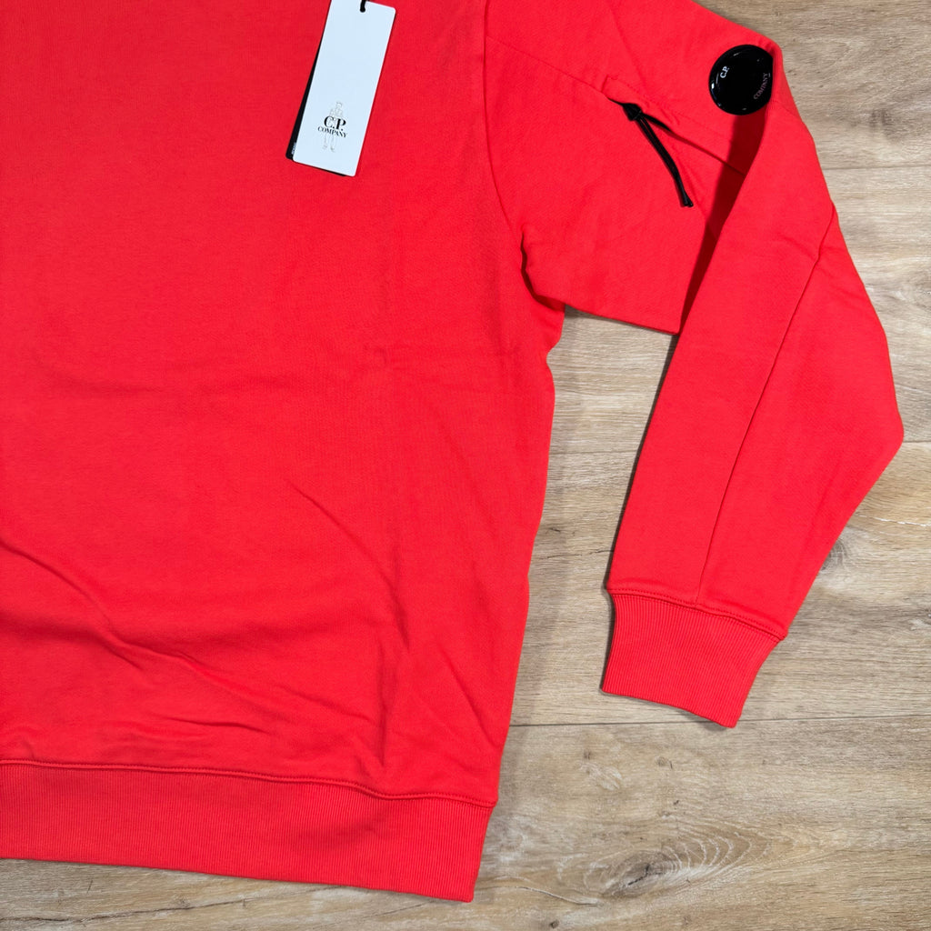 CP Company Diagonal Raised Fleece Lens Sweatshirt in Poinciana Orange